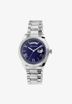 Silver stainless steel watch with a blue dial, Roman numeral markers, date display, and a textured bezel. Features a link bracelet design.