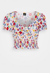 Top floreale corto con maniche a palloncino, realizzato in tessuto leggero. Presenta un corpetto arricciato, scollatura a V e un dettaglio a fiocco davanti.