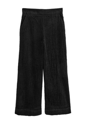 Pantalon large noir texturé avec taille élastique et poches latérales, présenté sur fond blanc.