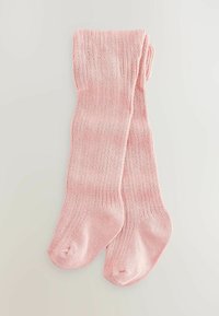 Chaussettes montantes roses avec une texture côtelée et une finition lisse. Bordées en haut, confectionnées avec des orteils arrondis pour le confort.