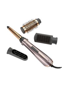 Ensemble d’outils pour coiffure avec un fer à friser chauffant et trois embouts de brosse interchangeables sur fond blanc.