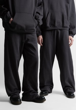 SWITCHBLADE UNISEX - Pantaloni de trening - old black