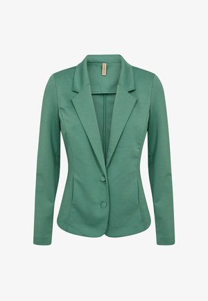 Blazer da donna verde su misura con rever a lancia, due bottoni rivestiti in tessuto e maniche lunghe.
