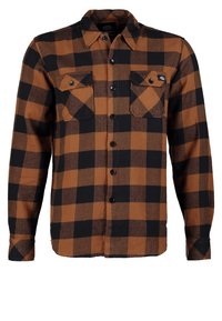 Camicia di flanella a quadri marroni e neri, con maniche lunghe, davanti con bottoni, due tasche sul petto e colletto standard.