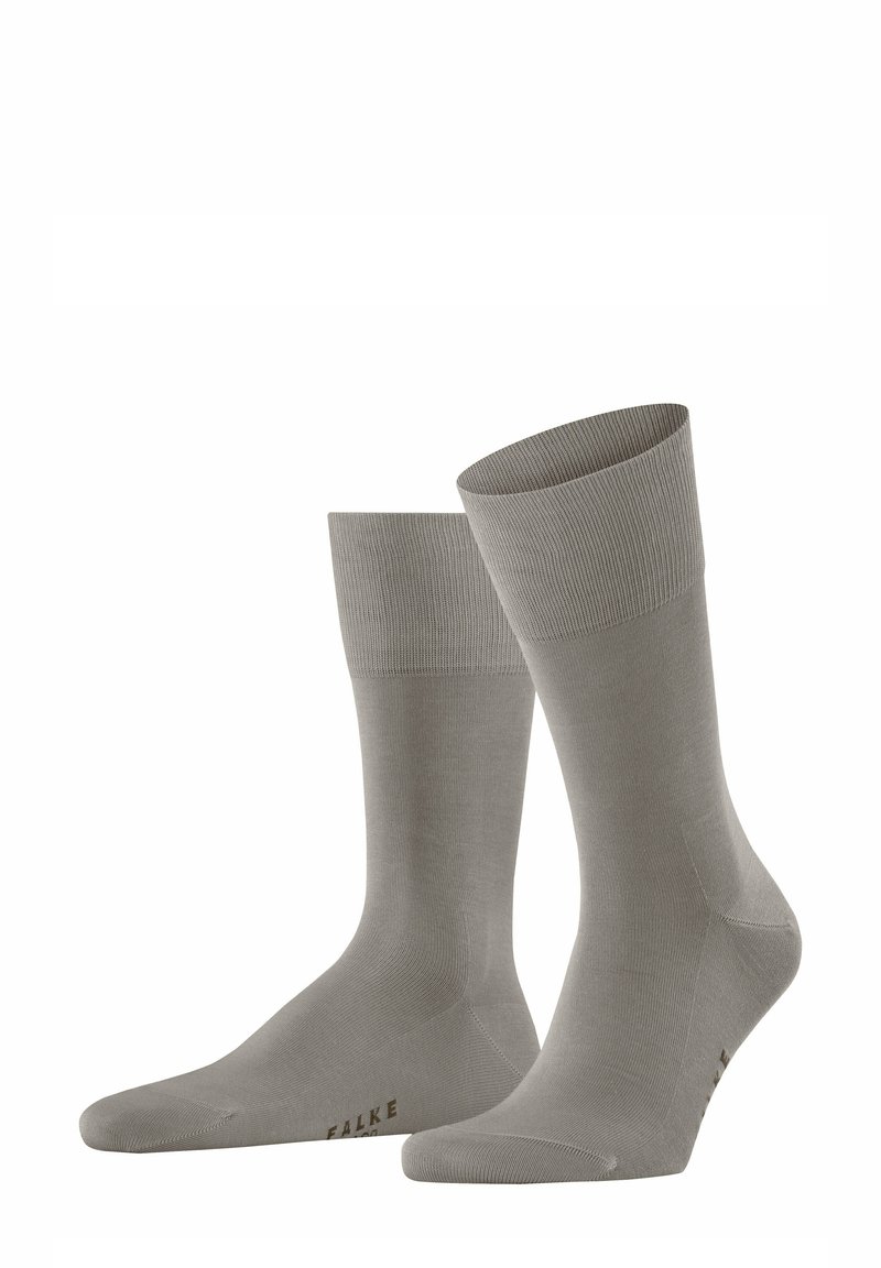 Calze grigie in cotone misto con orli a costine, texture liscia e punta rinforzata. Presentano il nome del marchio "FALKE" sul lato.