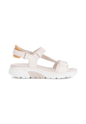 Lichtbeige sandaal met open teen, verstelbare bandjes, gevoerde zool, witte geribbelde buitenzool en gevoerde oranje hielondersteuning.