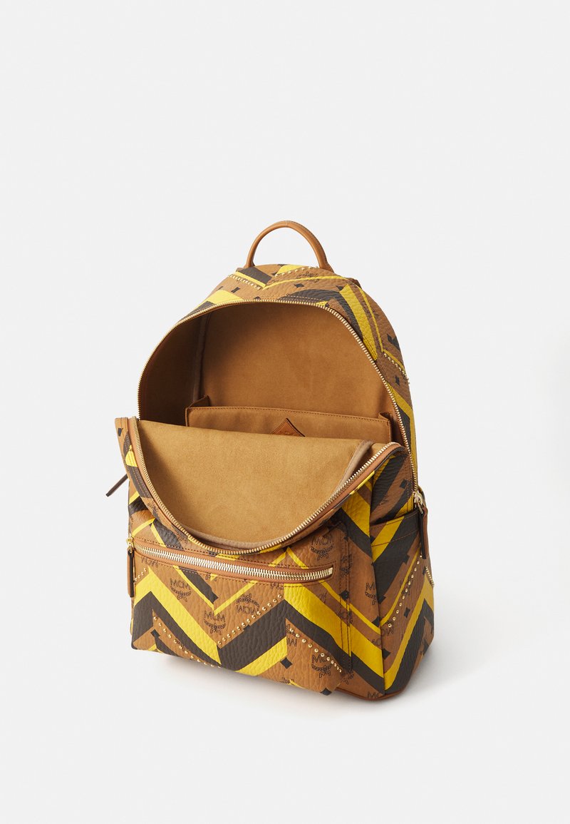 cognac yellow leather backpack For Men | 16" Laptop Backpack | Leather Backpack For Women | Suede College Backpack 12in L X 13in H X 5.5in D Handle Drop 5.5 in Adjustable Backpack Straps 25in This product is not affiliated with Michael Kors. La Jolie Luxe Diaper Bag