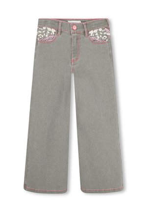 Jean gris droit avec surpiqûres roses et tissu imprimé léopard à l'intérieur des poches avant, fermeture par bouton rose.