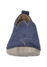 Navy blue slip-on shoe featuring a textured leather upper, contrasting stitching, and a flexible rubber sole. Rounded toe with minimal detailing.
