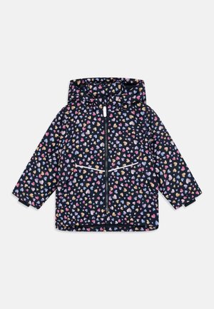 Child’s navy blue hooded jacket with multicolored heart pattern, front zipper, and reflective strip across front pockets.