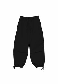 Pantalon noir ample en tissu léger, avec une taille élastique et un cordon de serrage, et des ourlets resserrés avec des liens réglables.