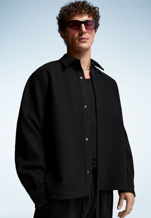 Bershka OVERSHIRT - Veste légère - black