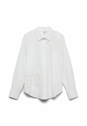 Balta krekla ar garajiem piedurknēm, uz priekšpuses izšūti ziedu rotājumi, klasiskā apkakle un pogu aizdare. Gluda auduma tekstūra.