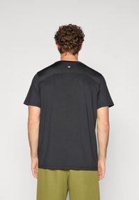 Champion TRAINING CREWNECK  - Spordi T-särk - black