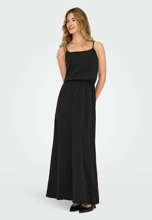 Robe maxi noire avec des bretelles spaghetti, une taille élastique, un tissu fluide, une texture lisse et une coupe décontractée. Se marie bien avec des talons noirs.