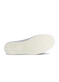 Vit sneakersula med en texturerad yta med cirkulära mönster. Materialet är gummi, utformat för grepp och hållbarhet.