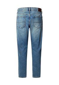 Light blue denim jeans with a straight cut, five pockets, and a leather patch at the waistband. Faded finish with subtle whiskering details.