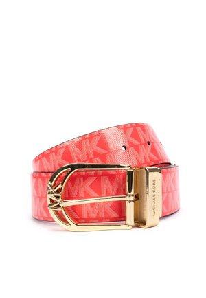Red Michael Kors belt with repeating MK logo pattern and gold-tone buckle engraved with brand name, coiled on white background.