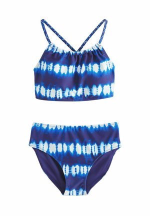 Bikini v modri tie-dye vzoru, ki ima zgornji del z detajli nabrane oblike z nastavljivimi naramnicami in ujemajoče se spodnji del, oboje iz mehke in raztegljive tkanine.