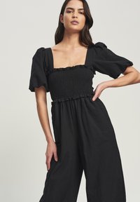 CALLI CORA - Mono - black