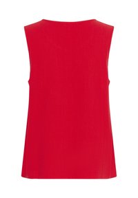 Top sin mangas rojo, confeccionado en tejido suave, con escote redondo y un corte holgado. Presenta un dobladillo recto y sin patrones ni herrajes visibles.