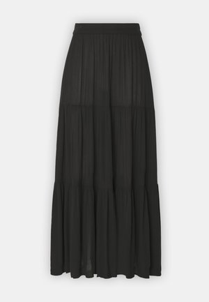 Gonna maxi nera realizzata in tessuto leggero. Presenta strati a volant, texture plissettata e una vita elastica per il massimo comfort.