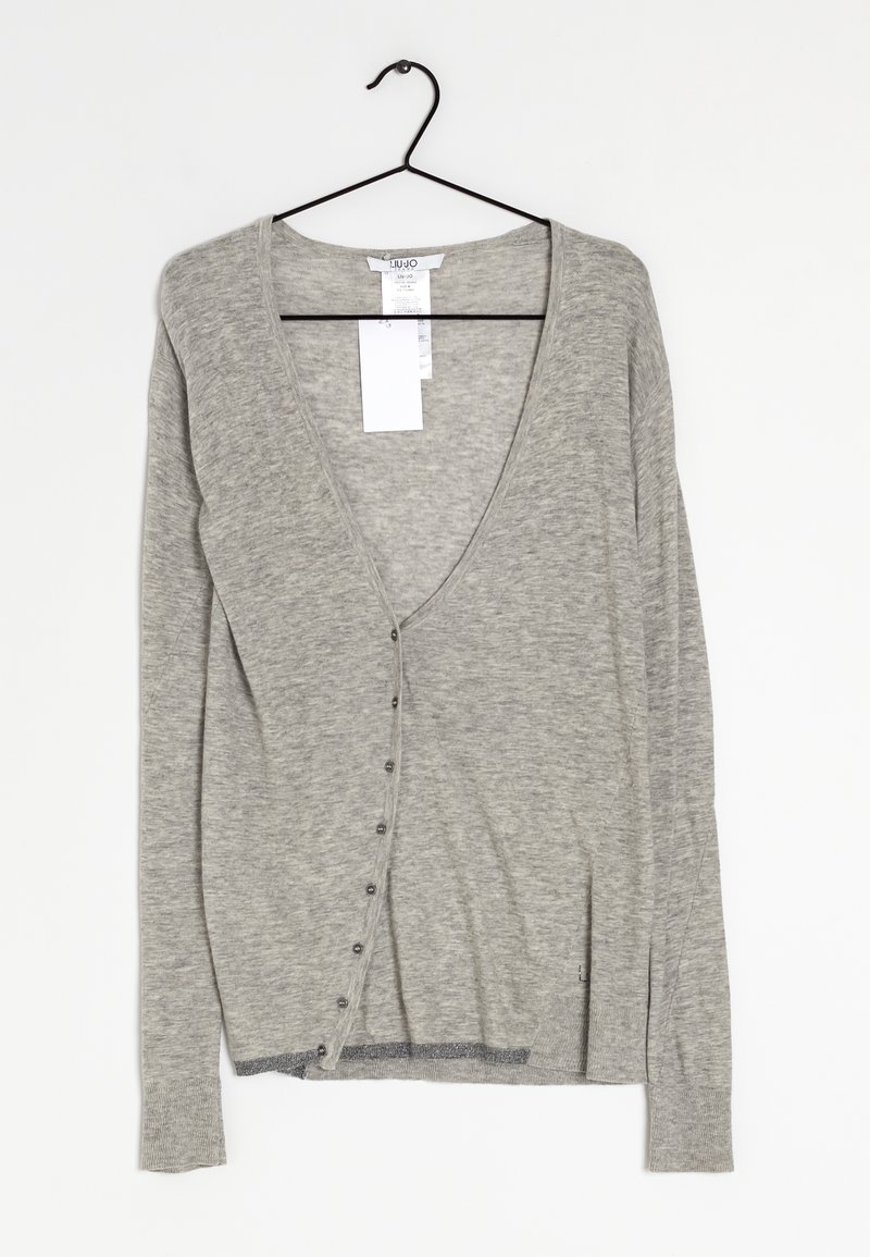Gray cardigan made of soft knit fabric, featuring a deep V-neck, long sleeves, and front buttons, with a subtle shimmer at the hem.