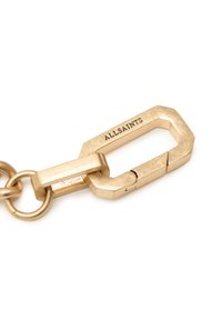 Chaîne en métal doré avec un fermoir octogonal à finition texturée et logo gravé "ALLSAINTS". Surface lisse et conception durable.
