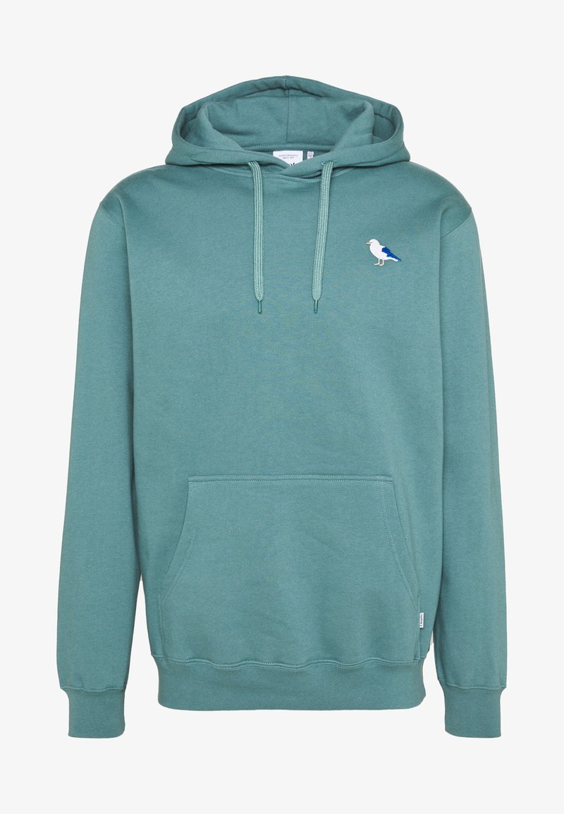 Teal hoodie made of soft fabric with a front pocket, drawstring hood, and small embroidered bird design on the left chest.