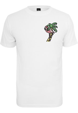 White cotton t-shirt featuring a colorful graphic of a flamingo beside a palm tree, with vibrant pink, green, and yellow accents.