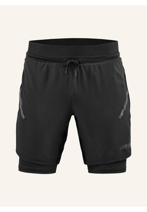 Zwarte sportshorts met een trekkoord in de taille, zijzakken en contrasterende grijze accenten. Bevat een kortere buitenlaag met een strakke binnenvoering.