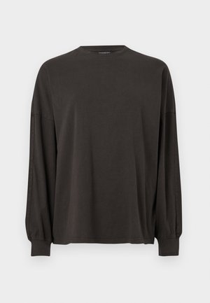 Langärmliges dunkelgraues T-Shirt aus weicher Baumwolle, mit Rundhalsausschnitt, überschnittenen Schultern und enganliegenden Bündchen. Glatte Textur mit minimalen Nähten.