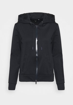 Zwarte hoodie met ritssluiting, voorzakken, capuchon met trekkoord en de tekst "ARMANI EXCHANGE" in reliëf op de linker mouw.