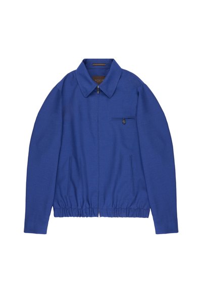 Blue zip-up jacket with a pointed collar, elastic waistband, two side pockets, and a small buttoned chest pocket.
