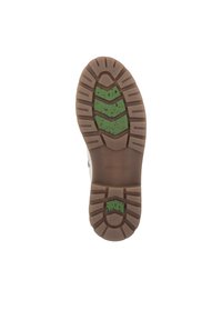 Bruine rubberen schoenenzool met groene antislip pads en een gestructureerd ontwerp, voorzien van richtinggevende groeven en een versterkt hakgedeelte.