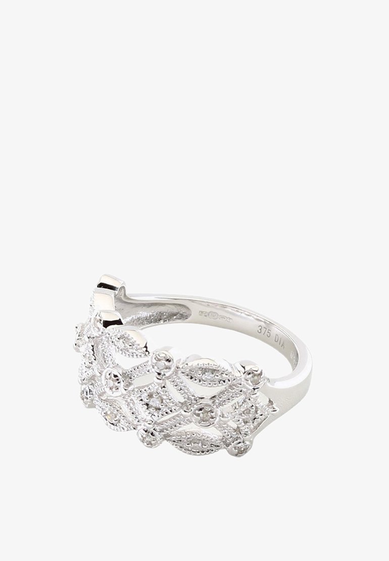 Hõbe sõrmus keeruka pitsitaolise disainiga, millel on väikesed ümmargused aktsendid. Sile bänd poleeritud viimistlusega ja detailse tekstuuriga.