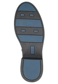 Rubber shoe sole with a blue textured grip pattern. Features three dark blue sections, circular accents, and a label reading "BLUE GRIP."