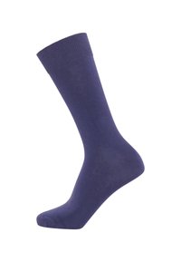 Navy blue cotton sock with a ribbed cuff, smooth texture, and an elongated shape designed to cover the calf. Version for ankle to mid-calf length.