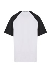 Raglan short-sleeve T-shirt featuring a white body and black sleeves, made from cotton, with a classic crew neck and smooth texture.