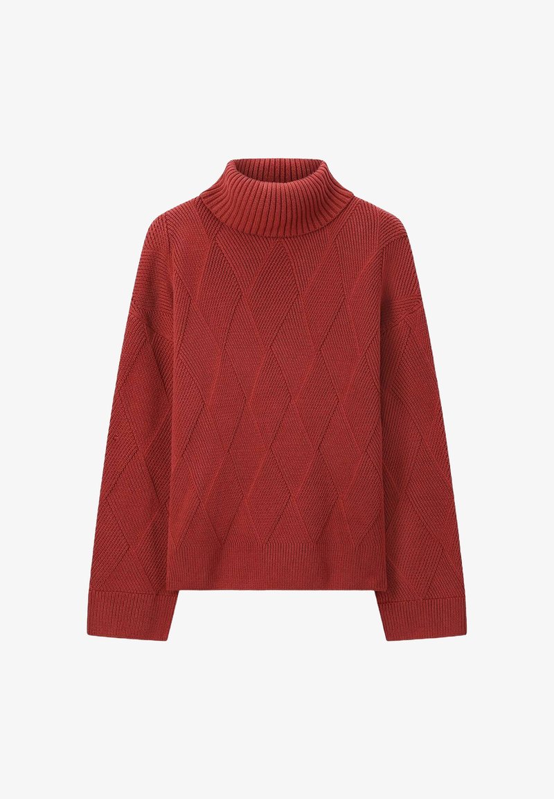 Pull en tricot rouge avec un motif en losanges, col roulé et manches longues à texture côtelée. Design avec une longueur cropped.