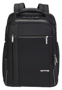 Zaino nero in nylon con finitura testurizzata. Caratterizzato da diversi scomparti con zip, spallacci imbottiti e una maniglia superiore.