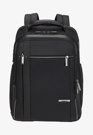 Zaino nero in nylon con finitura testurizzata. Caratterizzato da diversi scomparti con zip, spallacci imbottiti e una maniglia superiore.
