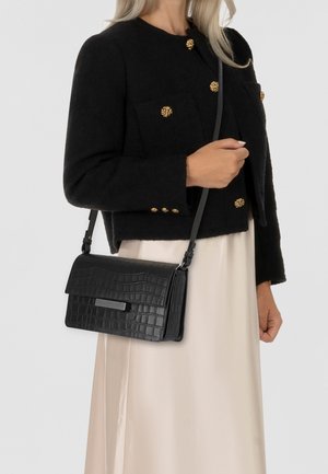 ALEX 24 CM - Cross body bag - black