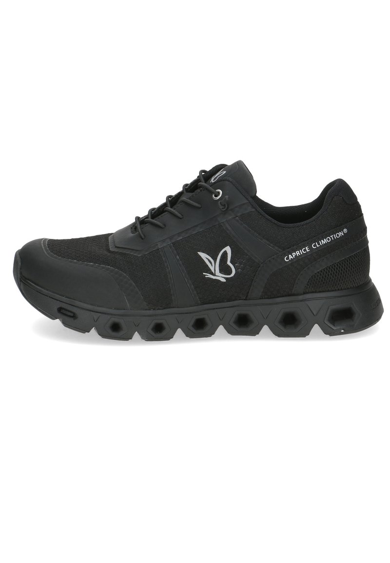 Black athletic shoe with a mesh and synthetic upper, hexagonal sole design, reflective logo, and lacing system for secure fit.