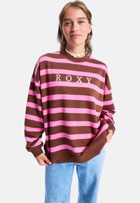 Bruine en roze gestreepte sweatshirt met het logo "ROXY ESTABLISHED 1990". Losse pasvorm, ronde hals, zachte katoen stof, lange mouwen.