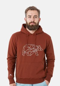 Felpa con cappuccio marrone in cotone. Presenta un design geometrico di un orso bianco sul davanti, una tasca anteriore e polsini a costine.