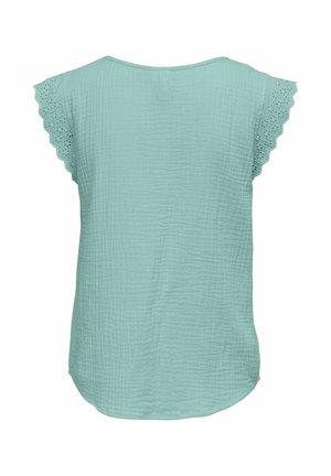 Un top verde menta con un tessuto testurizzato, caratterizzato da maniche corte a scallop con dettagli in occhio di pernice e un orlo arrotondato.