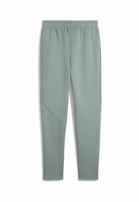 Pantalons de sport vert clair avec une coupe fuselée, taille élastique, tissu lisse et détails de panneaux latéraux géométriques.