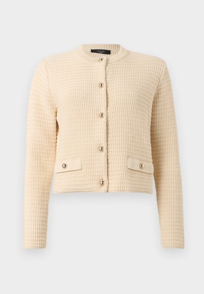 Κρεμ πλεκτή ζακέτα με μακριά μανίκια, στρογγυλή λαιμόκοψη, χρυσούς κουμπιά στο μπροστινό μέρος και δύο μικρές μπροστινές τσέπες με λεπτομέρειες κουμπιών.