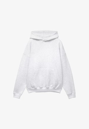 Hanorac gri cu glugă, fabricat dintr-un amestec moale de bumbac. Are o buzunar frontal, manșete și tiv cu țesătură răsucită. Croială lejeră, fără modele sau accente.